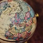 Trump’s New Policy Rewrite – A Stark Blow to European Security Close up of vintage globe showing Europe and Africa