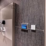 Keypad and touch screen beside secure stainless steel door