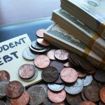 Note with student debt, coins, and banknotes