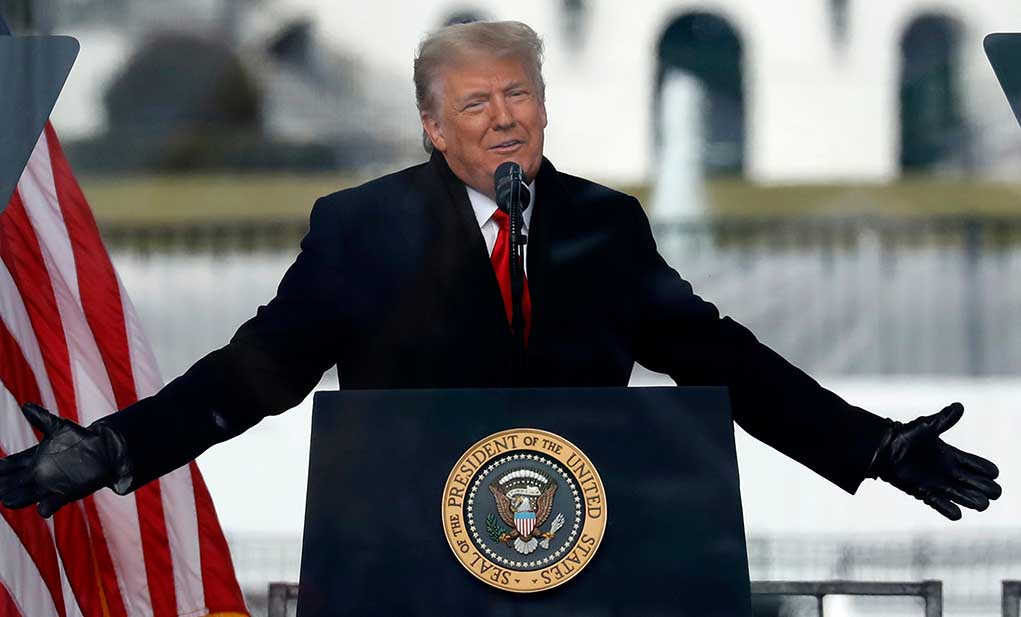 1913298577 featured image Trump speaking at a podium with microphones