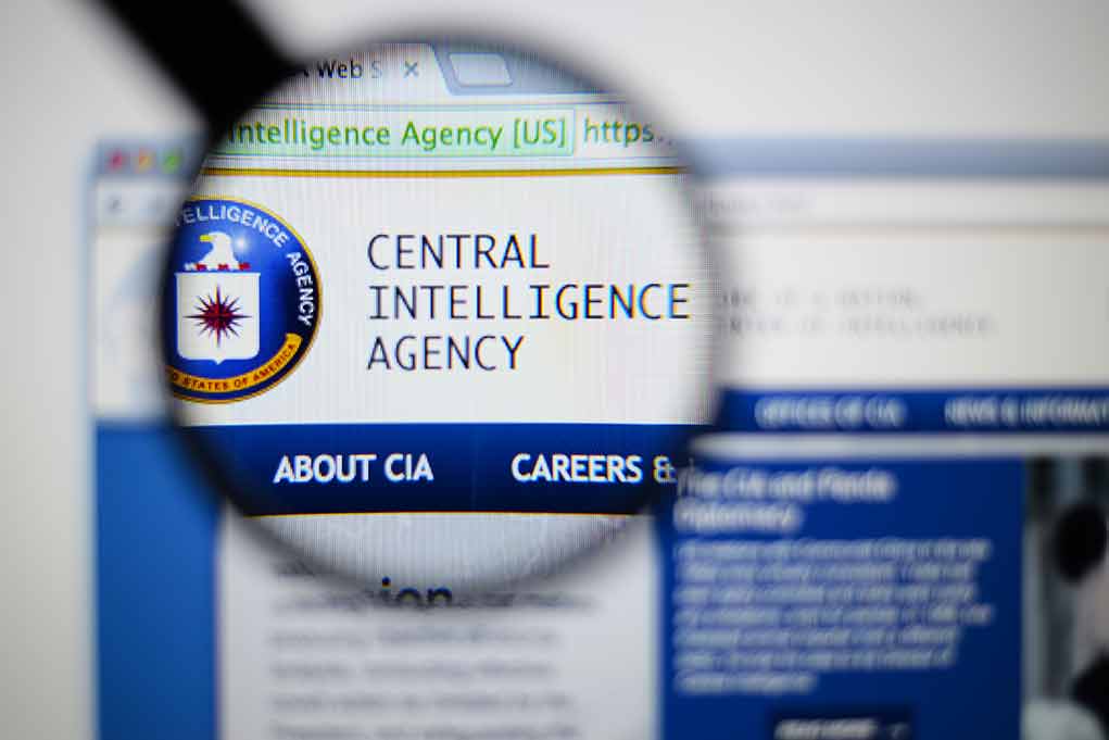Magnifying glass over Central Intelligence Agency webpage