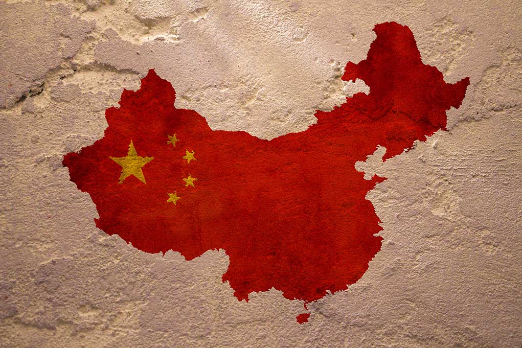 409776640 featured image Map of China with flag on textured wall