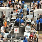 Shocking TSA Watchlist Tracked Intel Chief Airport security checkpoint with passengers and staff busy