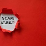 $3.5 Billion and Counting: How Cyber Scams Are Impacting American Wallets Red paper tear with the words scam alert