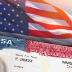 Trump’s Bold Immigration Move: What Rwanda Talks Mean for US Policy Closeup of US visa and flag image