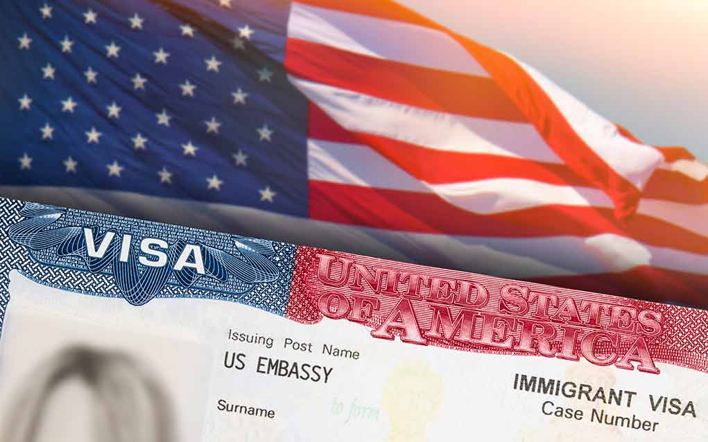 Closeup of US visa and flag image