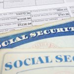 Experts SOUND ALARM as Social Security Falters Social security cards on top of tax documents