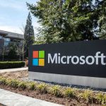 Microsoft’s Nuclear Deal STUNS Experts Microsoft sign with office buildings and trees