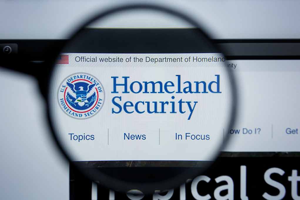 Magnifying glass showing Homeland Security website