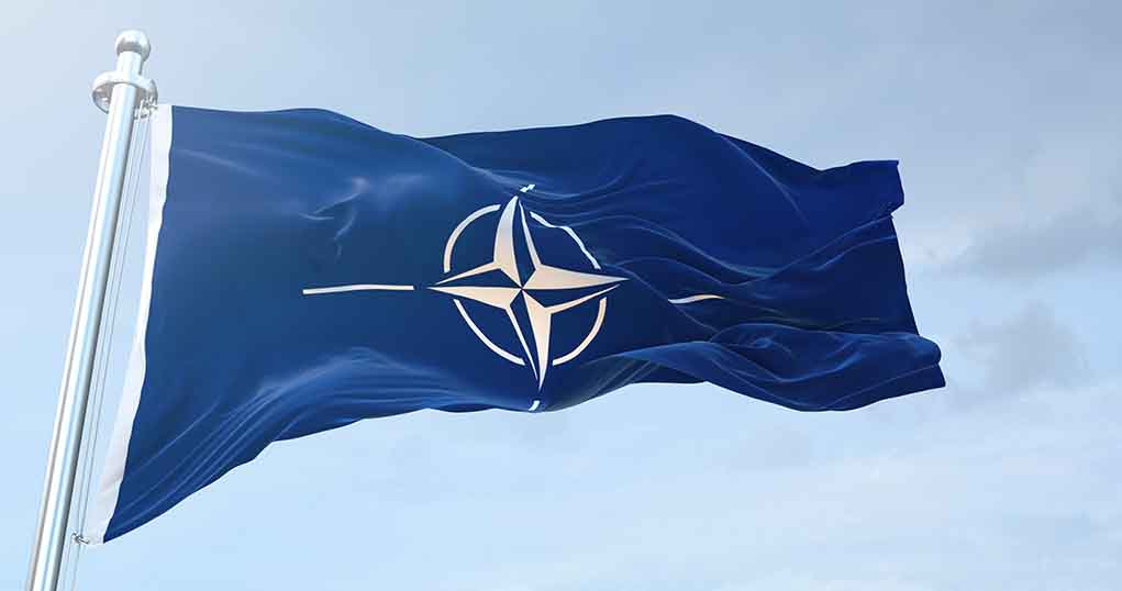1633919905 featured image NATO flag waving against blue sky