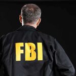 Sleeper Cell FEARS After LA Sting Operation Person wearing jacket with FBI printed on back