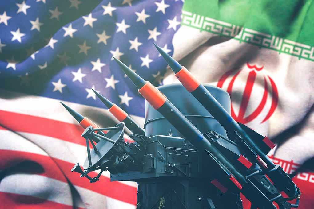 1628170834 Iran and USA flags with missile launcher