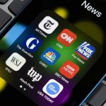 Feds Ambushed? CNN Tied to Threatening App News app icons on a smartphone screen