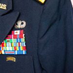 Military jacket with ribbons and badges displayed