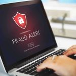 ActBlue CEO Faces Explosive Fraud Allegations Laptop displaying fraud alert warning on screen