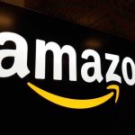 CHAOS ERUPTS: Prime Day Turns Into Retail War Amazon logo with a yellow smile arrow