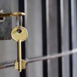 Grenada Horror: Escaped Killers Sentenced Key in lock of prison cell door.