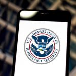 US Department of Homeland Security logo on smartphone