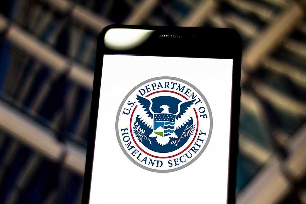 US Department of Homeland Security logo on smartphone