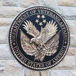 Department of Veterans Affairs seal on brick wall