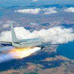 Passenger airplane with rocket engine flying over countryside