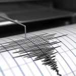 Bay Area Shaken: Quake Hits Oakland! Seismograph needle recording earthquake activity on paper.