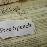 Radical Left Blamed—Bondi’s Bold Promise Old document with text Free Speech overlay