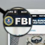 FBI THWARTS Preschool Attack – Agents Storm In! FBI website shown through magnifying glass.