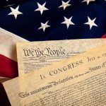 Founders’ Rituals EXPOSED—Not What History Books Say The Declaration of Independence laid on an American flag