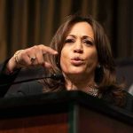 Kamala Comeback? 2028 Plot Shakes Up DC Person speaking passionately at a podium.