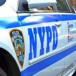 Mamdani’s Radical Ties Raise NYC Fears NYPD police car with logo and text.