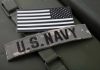 Navy SEAL Targets Kentucky Congressman U.S. Navy patch with black-and-white American flag.