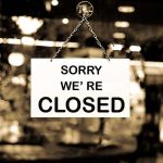 Schumer Finally EXPOSES PREMEDITATED Shutdown Plot Closed sign hanging in a shop window.