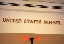 Funding Showdown: Hawley’s 94% Plan Sign displaying United States Senate in a government building