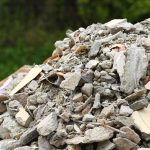 Massive White House Demolition – Trump On The MOVE! A large pile of construction debris consisting of broken concrete and other materials