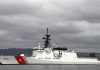 Cyber Admiral BREAKS 230-Year Military Tradition A U.S. Coast Guard ship docked under cloudy skies