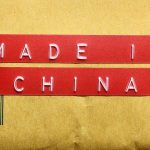 China in the HOTSEAT — Trump Does the UNTHINKABLE! Red label reading MADE IN CHINA on brown packaging