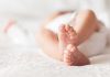 Chemical Horror—Drain Cleaner Destroys Baby’s Life Close-up of baby feet lying on blanket.
