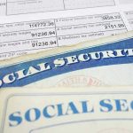 Congress’s Medicare Plot: Are Seniors Trapped? Social security cards on top of tax documents