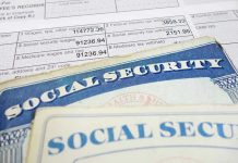 Congress’s Medicare Plot: Are Seniors Trapped? Social security cards on top of tax documents