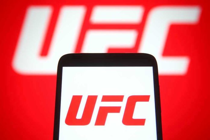 2049779753 UFC logo on phone screen and background.
