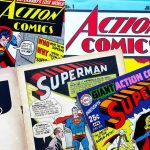 $9.12M Attic Find Shatters Auction Record! Assorted vintage Superman and Supergirl comic book covers.