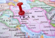 Tehran’s Collapse—Unthinkable Exodus Feared Red pushpin marking Iran on a map.