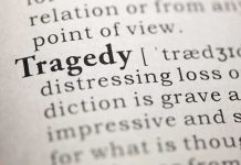 Homeowner Shoots Mother of Four — A Shocking Turn Close-up of the word 'Tragedy' in a dictionary with its definition