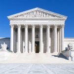 Liberal Panic Implodes—Supreme Court Stays Silent The Supreme Court building featuring marble columns and a clear blue sky