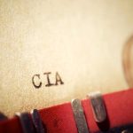 Close-up of a typewritten document labeled 'CIA'