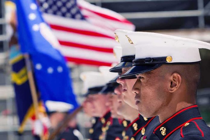 shutterstock_355868381 (1).jpg Marines in uniform standing in formation with flags in the background