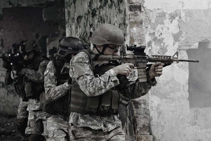 Soldiers in tactical gear advancing through a damaged building