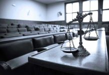 Justice System Goes Soft on Violence Against Children Scales of justice in an empty courtroom.