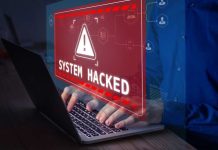 200 Million Users Exposed in Massive Adult Website Data Breach Warning sign System Hacked on laptop screen.